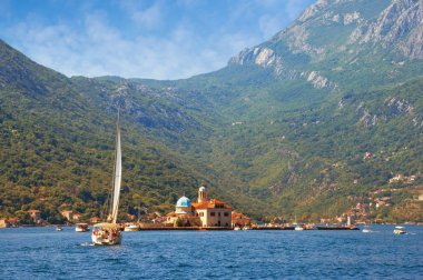 View of Bay of Kotor and Island of Our Lady of the Rocks ( Gospa od Skrpjela ) on sunny autumn day. Montenegro