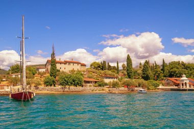 Montenegro,  Bay of Kotor, Coast of Miholjska Prevlaka Island or Flower island. View of Monastery of Saint Archangel Michael from sea