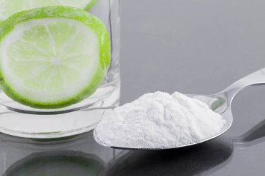 pişirme ve gri arka plan üzerine limon.