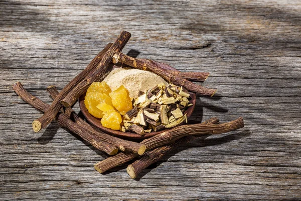 licorice powder and resin, on the table - Glycyrrhiza glabra