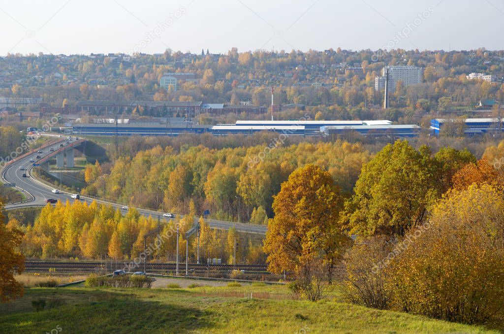 Autumn view of the Dmitrov highway and the bridge over the channel name of Moscow from Peremilovskaya height. Dmitrov district, Moscow region, Russia