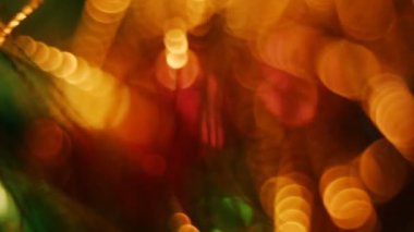 Soyut bulanık Noel Bokeh arka ışıklar. Pırıltı Noel ağacı ışıkları yanıp sönüyor. Kış tatil kavramı