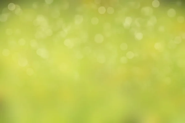 Beautiful bright green bokeh, blurred abstract background for your own creations — Stock Photo, Image