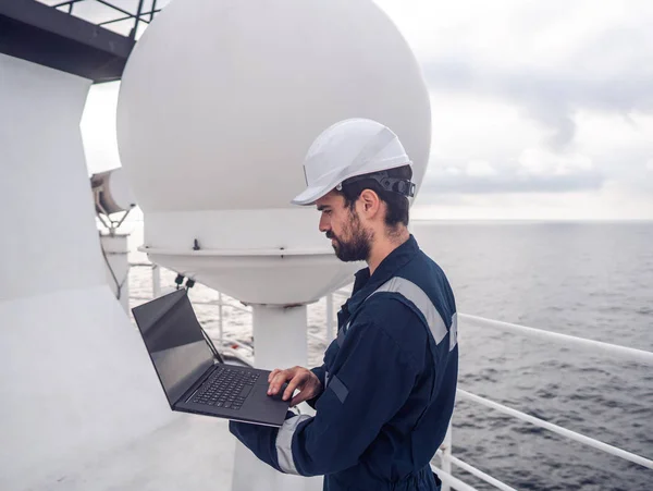 Service technician or serviceman near VSAT terminal