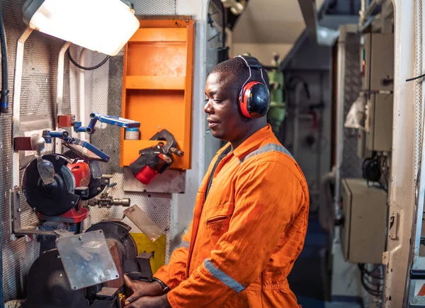 Marine engineer officer working in engine room