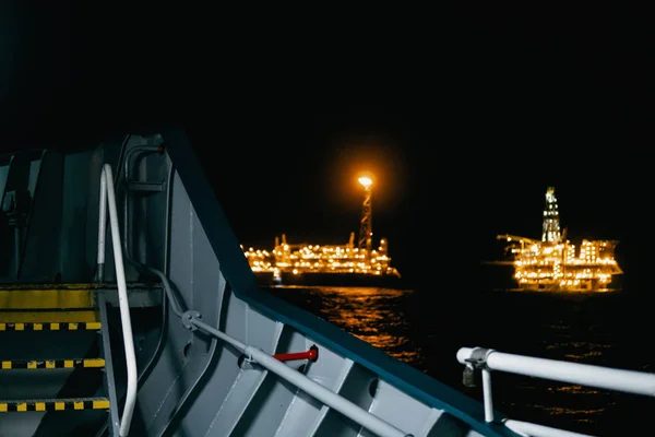 FPSO tanker vessel near Oil platform Rig.