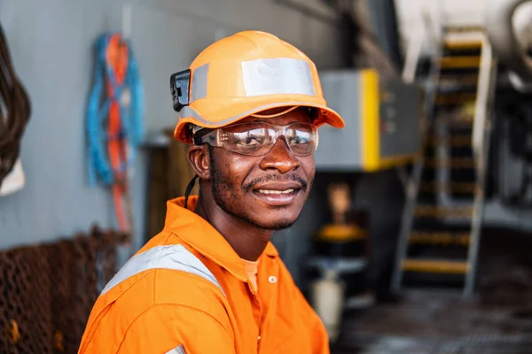 Happy Seaman AB or Bosun on deck of vessel or ship — Stock Photo, Image