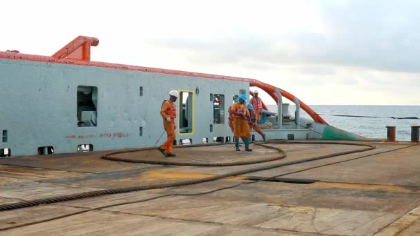 Anchor-handling Tug Supply AHTS vessel crew preparing vessel — Stock Video