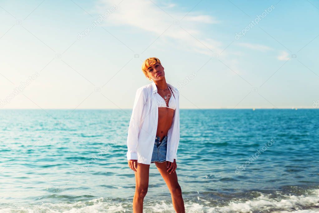 Beautiful sexy shemale woman posing at the beach