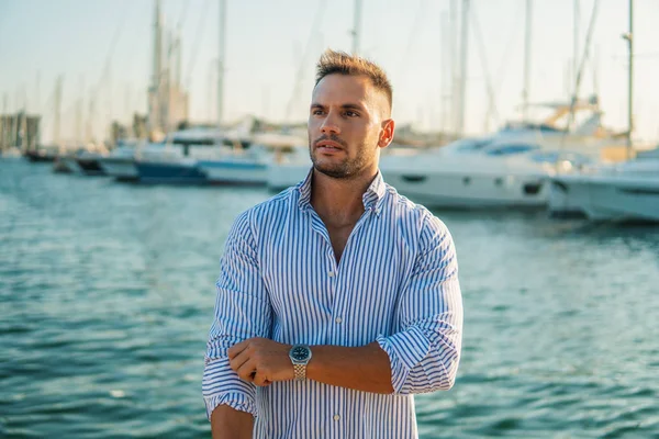 Young rich man at Yacht Club. Businessman is Relaxing