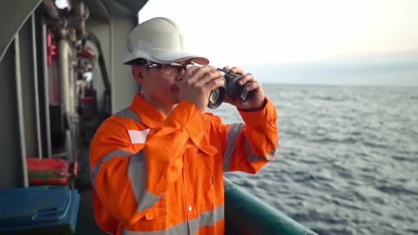 Filipino deck Officer on deck of vessel or ship , wearing PPE personal protective equipment — Stock Video