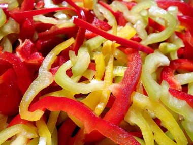 Arka plan taze dilimlenmiş taze dilimlenmiş biber biber renkli