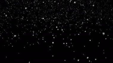 Siyah arkaplanda düşen kar taneleri