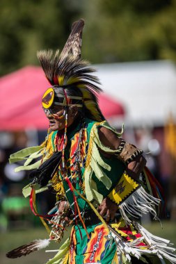Participant dancing Native American style at the Stillwater Pow Wow in Anderson, California. Oct. 7th, 2018. clipart