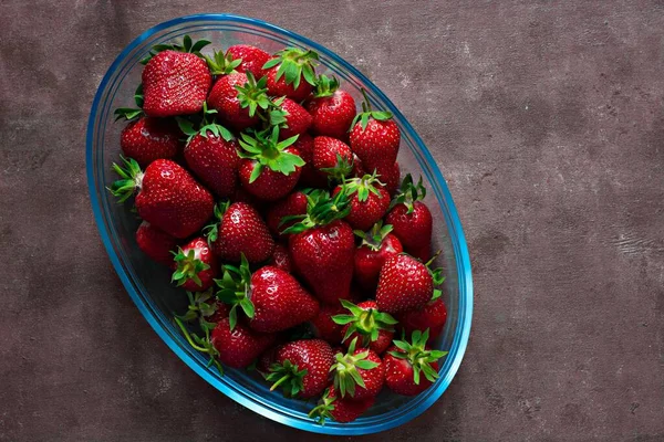 Fresh Ripe Strawberries Glass Dish Brown Background Top View — Stock Photo, Image