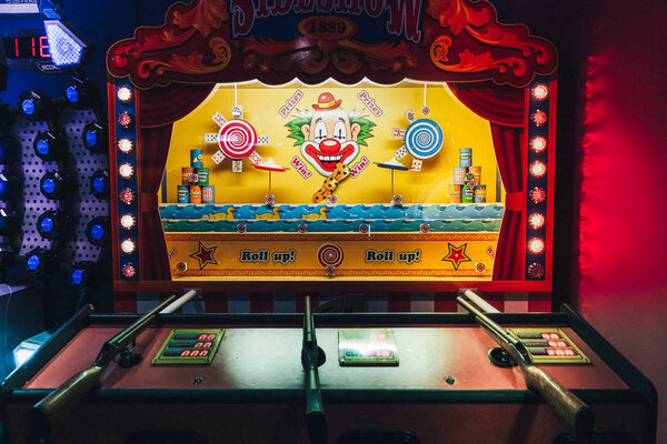 Brighton, England-2 October,2018: Classic vintage sideshow shooting gallery theme park arcade game carnival in casino game at the Hollywood Bowl Brighton Marina the place for entertainment and fun.