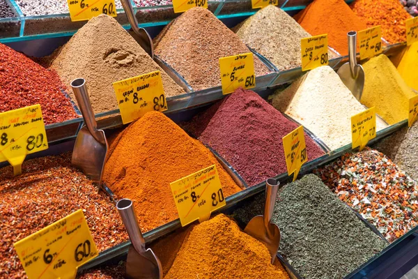 Egyptian Bazaar Market called Spices Market and the Grand Bazaar shopping place with dry spices powder and tea in Istanbul, Turkey.