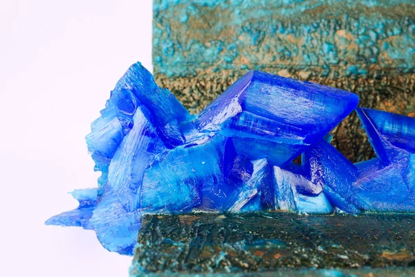 Patina and crystals of blue vitriol on copper plates anodes of galvanic installation close-up, copper sulphate, copper sulfate, bluestone, electroforming plates