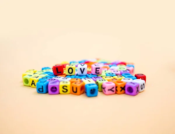 Love Colorful Cube Letters Orange Background — Stock Photo, Image