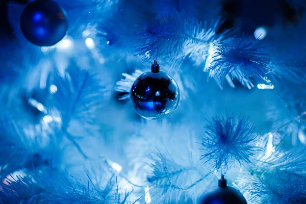 Christmas balls on a white fluffy Christmas tree — Stock Photo, Image