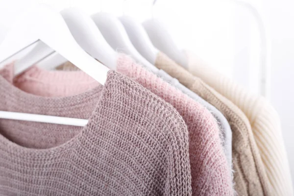 Warm Knitted Autumn Winter Clothes Hanging Rack Trending Concept Pastel — Stock Photo, Image