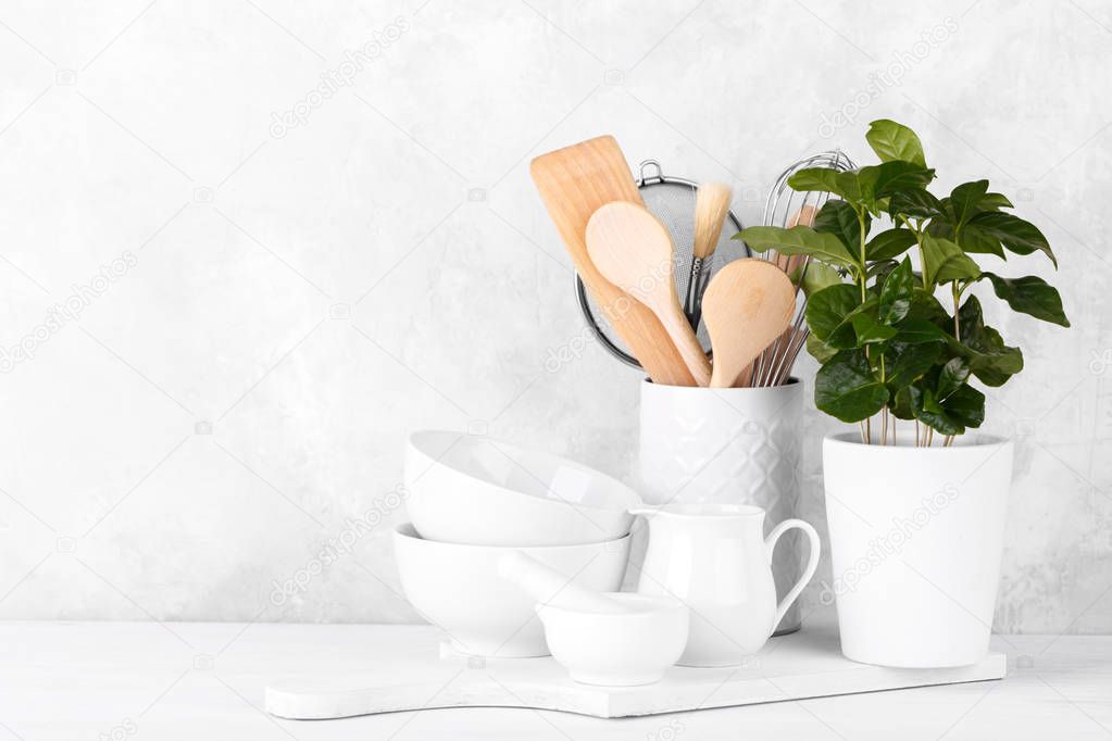 Kitchen shelf with white utensils