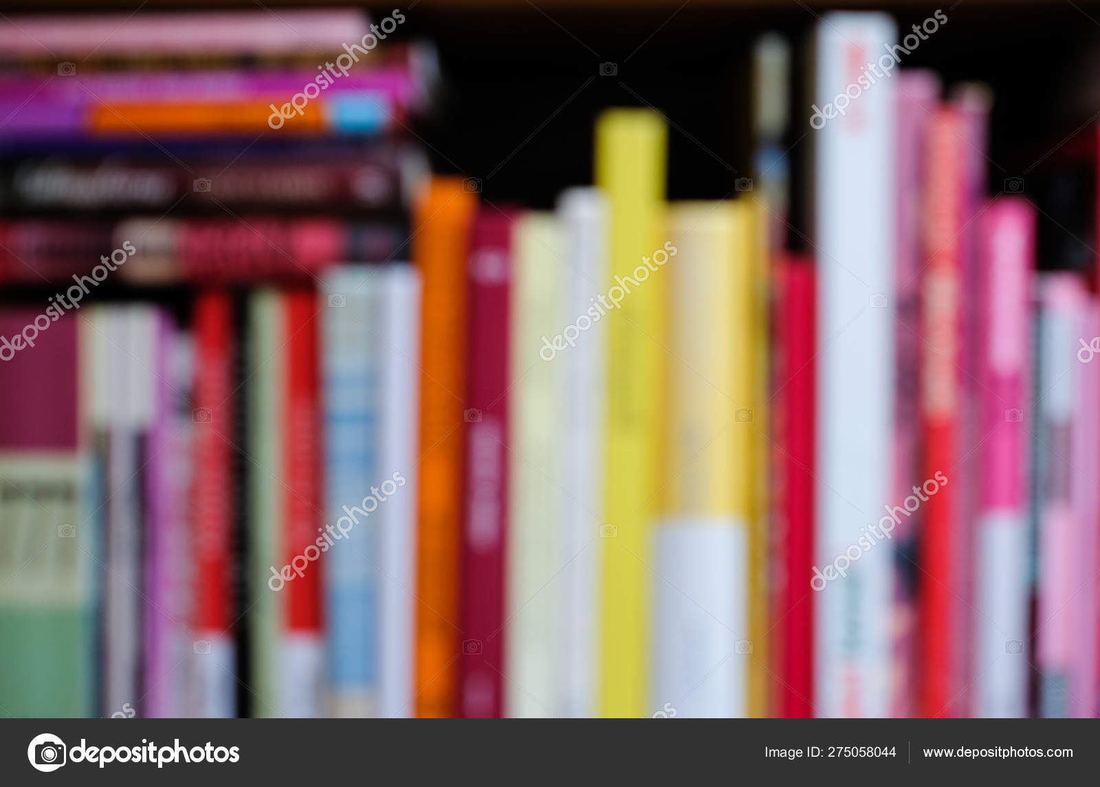 Abstract Blurred Bookshelf With Colorful Bright Books Education