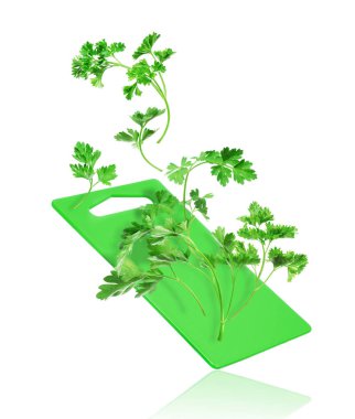 Beyaz arka plan üzerinde izole mutfak gemide maydanoz yaprakları düşmek