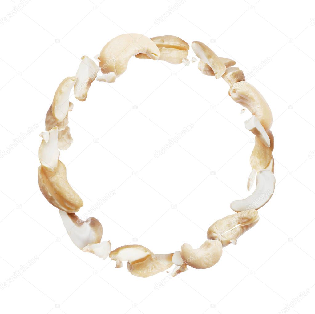 Crushed cashew in a circular motion on white background