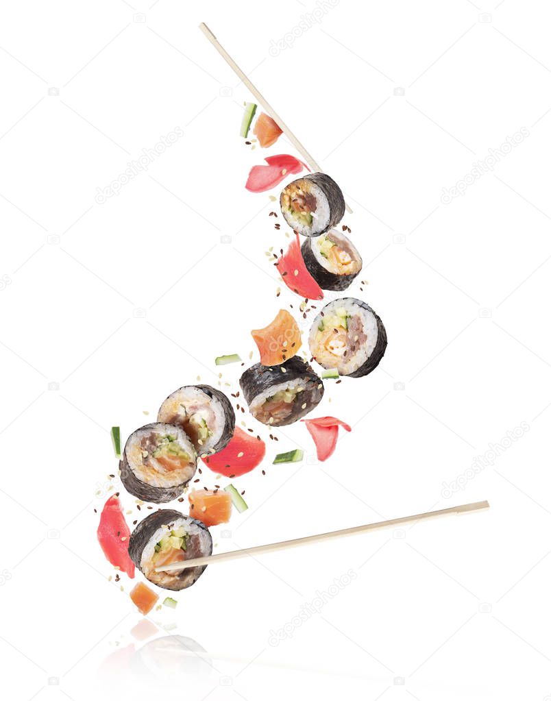 Fresh sushi rolls with salmon pieces in high resolution, isolated on white background 