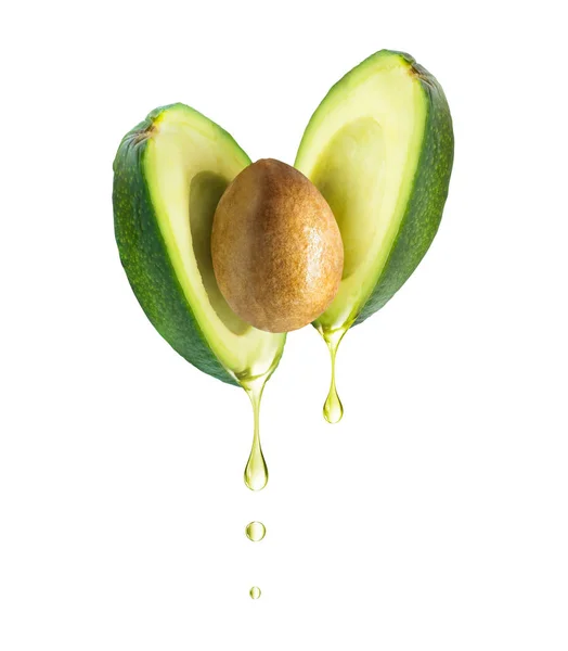 Gocce di olio sgocciolanti dall'avocado, isolate su fondo bianco — Foto Stock