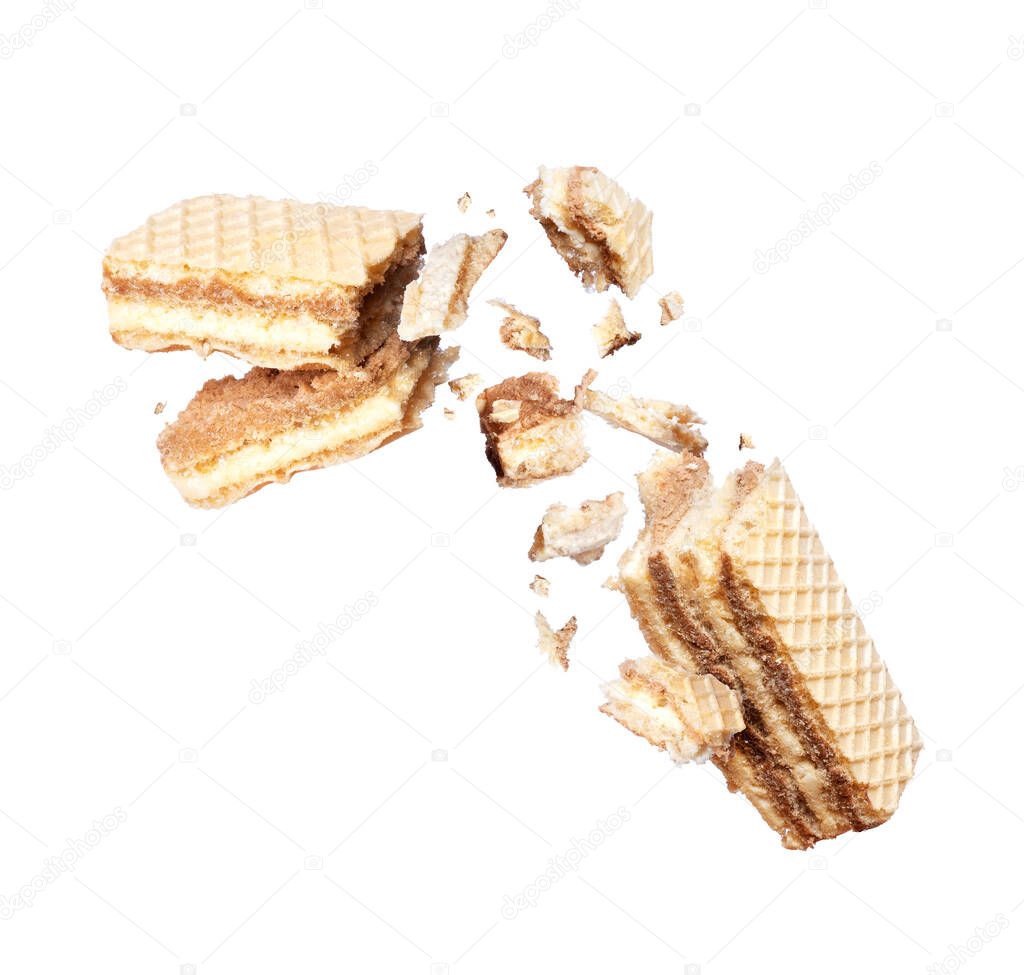 Waffles torn in two halves isolated on a white background