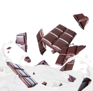 Çikolata parçaları süt damlalarında boğuluyor. 