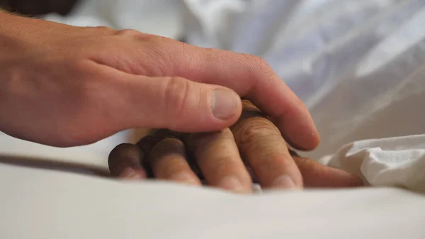 Grandson Takes Gently Touches Hand His Elderly Grandmother Lying Bed — Stock Photo, Image