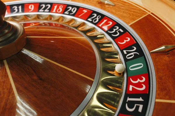 Beautiful casino roulette close-up with playing chips Stock Picture