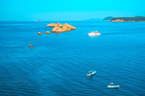 Aerial seascape view to turquoise waters of Adriatic Sea and islands in the distance, near town Dubrovnik in Croatia. Famous sailing travel destination Croatia, summer scenery in Europe - Dubrovnik — Stock Photo, Image