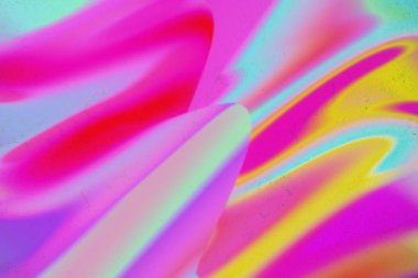 Somut arka plan üzerinde soyut neon renkli akışkan sanat.