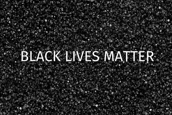 Black lives matter background on black and white surface. Royalty Free Stock Images