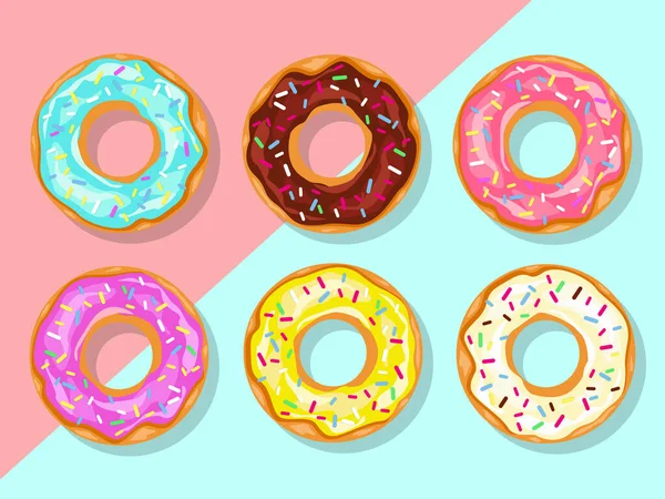 Pembe arka planda izole edilmiş serpinti desenli çörekler