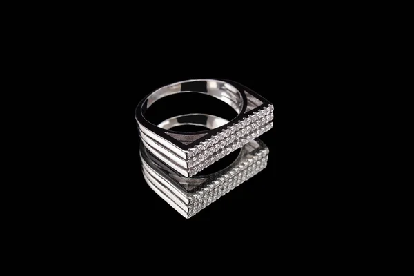 White gold ring with reflection on glass — 스톡 사진