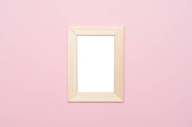 Ahşap çerçeve pastel pembe alay etmek yukarıya.