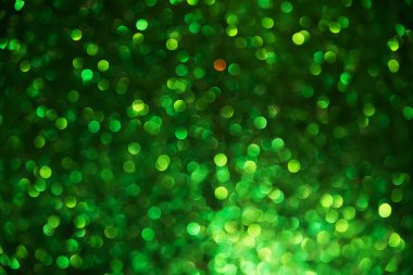 Yeşil Glitter vintage ışıklar arka plan. Bulanık Noel Soyut doku. Ufuk bokeh