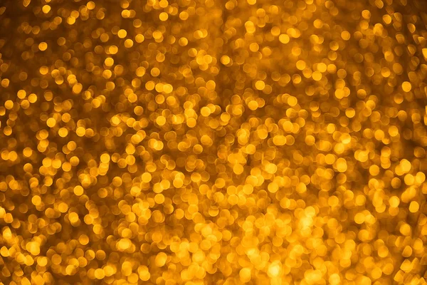 Oro Glitter vintage luces fondo. Textura abstracta borrosa de Navidad. Bokeh desenfocado — Foto de Stock