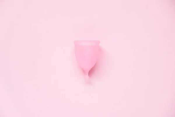 Menstrual cup on pink background. Alternative feminine hygiene product during the period. Women health concept — Stock Photo, Image