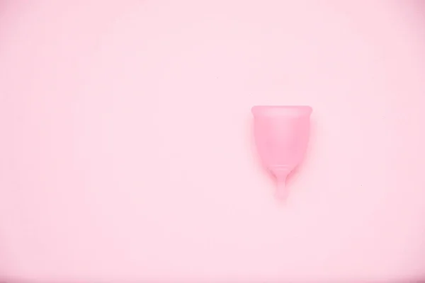 Menstrual cup on pink background. Alternative feminine hygiene product during the period. Women health concept — Stock Photo, Image