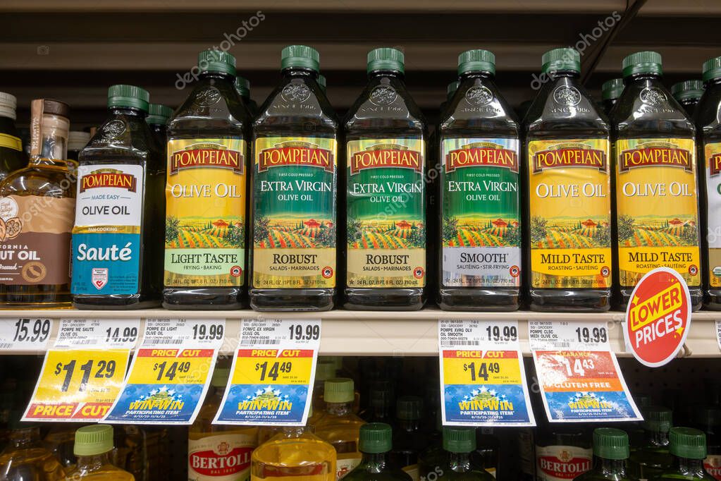 Davis, CA, USA. 22 August 2025. Supermarket store shelf with  Pompeian Olive Oil