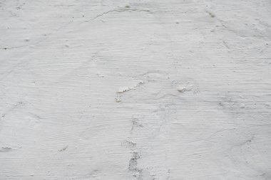 Beyaz sıvalı duvar. Kaba sıva.