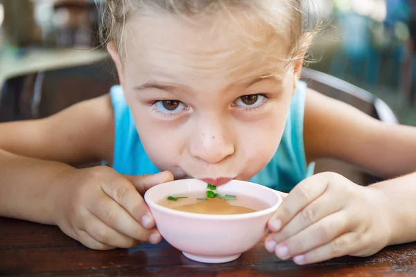 Baby boy is eating soup in Thailand — Stock Photo, Image