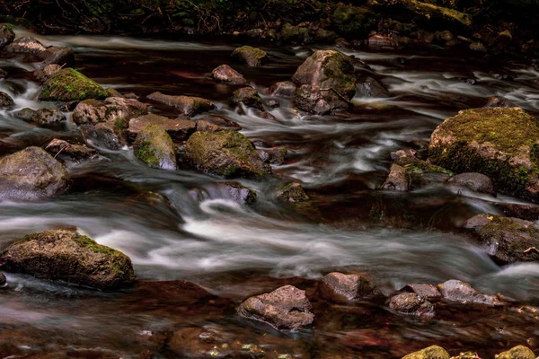 Long exposure of fast moving water in Dartmoor National Park