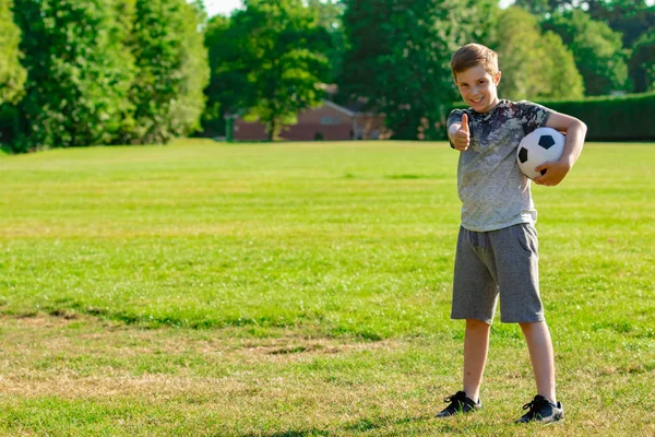 Pre Teen Boy Holding Football Park — Stock Photo, Image